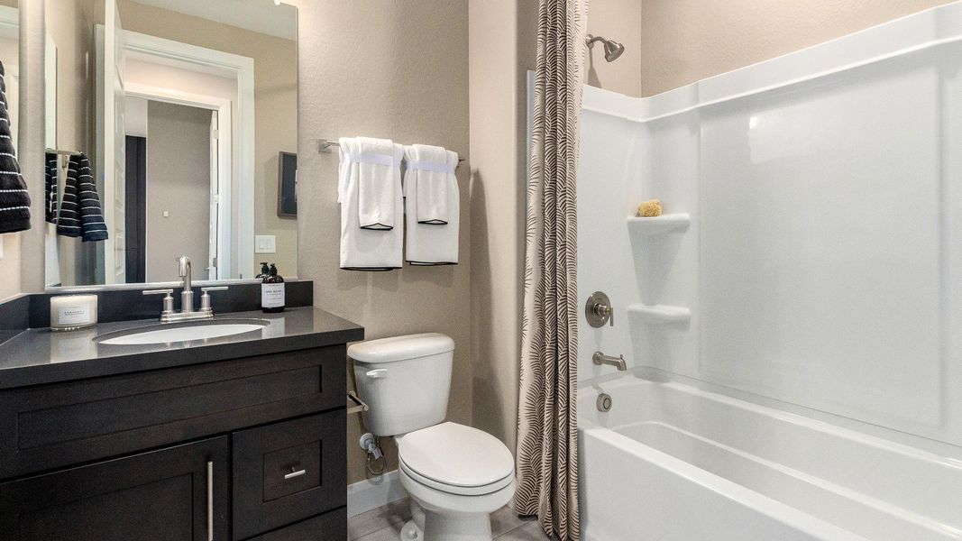 Representative furnished interior of a home built from the The Bella by DRB Homes in Surprise City Center, Surprise (Image 15). Representative furnished interior of a home built from the The Bella by DRB Homes in Surprise City Center, Surprise (Image 15).