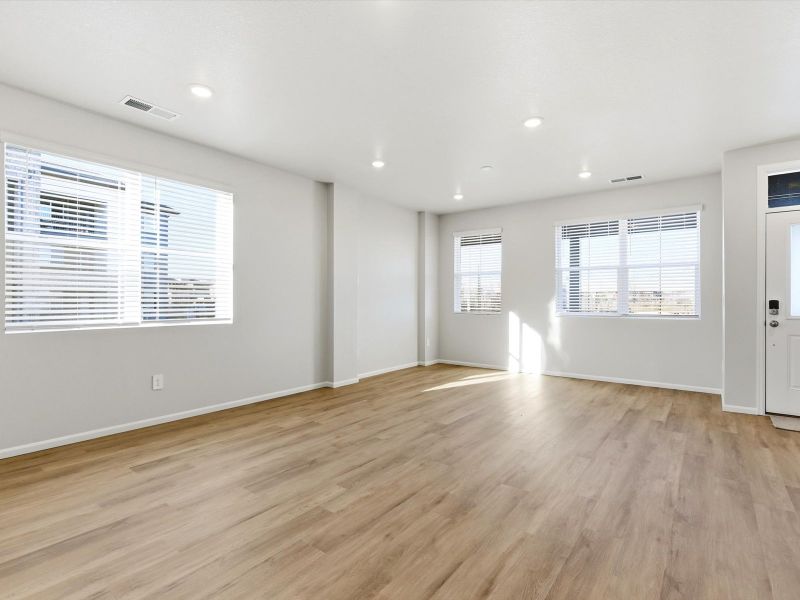 Spacious, unfurnished interior of a new home in Horizon Uptown: The Meadow Collection, Aurora (Image 9).