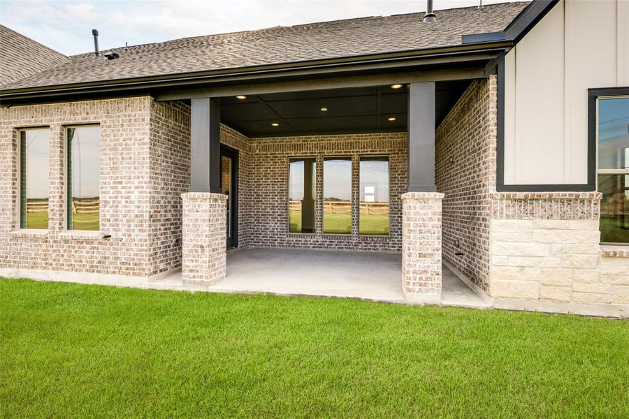 Exterior details and patio area of a home in Arborwood, Waller (Image 3).