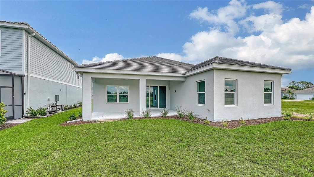 Exterior details and patio area of a home in Grand Park, Sarasota (Image 21). Exterior details and patio area of a home in Grand Park, Sarasota (Image 21).