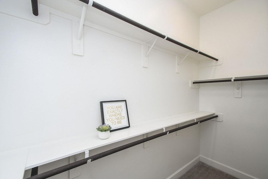 Two primary walk-in closets