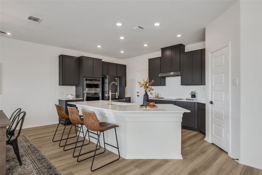 Furnished interior view inside a new home in Retreat at San Gabriel, Georgetown (Image 30).