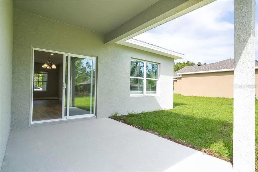 Front exterior of a new home in , Citrus Springs, FL, highlighting curb appeal (Image 2).
