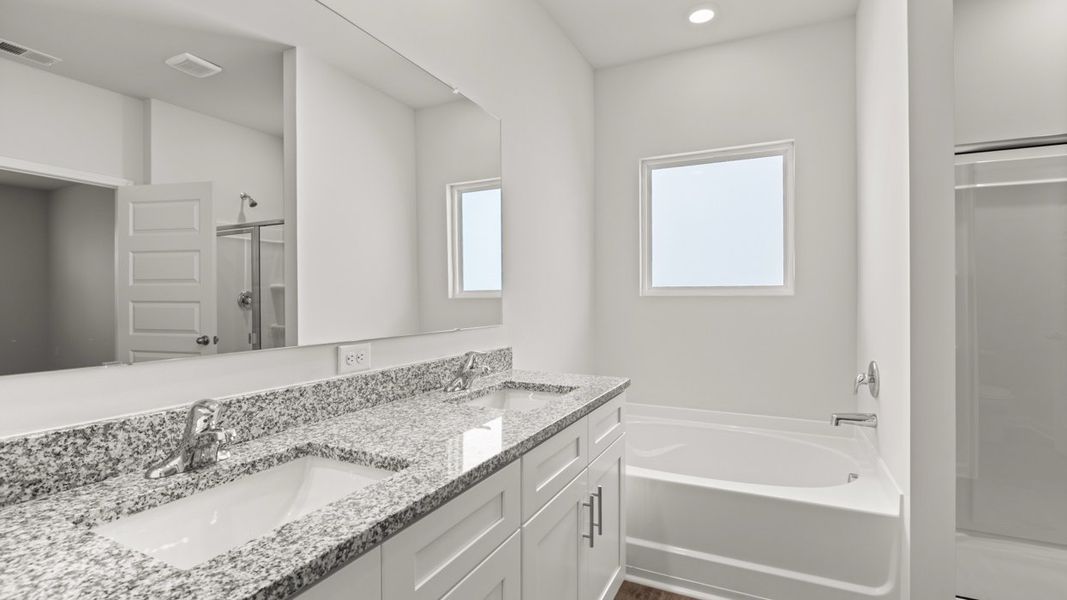 Representative furnished interior of a home built from the Elle by D.R. Horton in Highland Hills, Graniteville (Image 6).