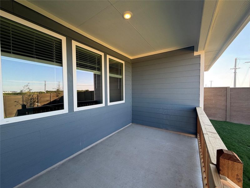 Exterior details and patio area of a home in Willow Springs, Buda (Image 13).