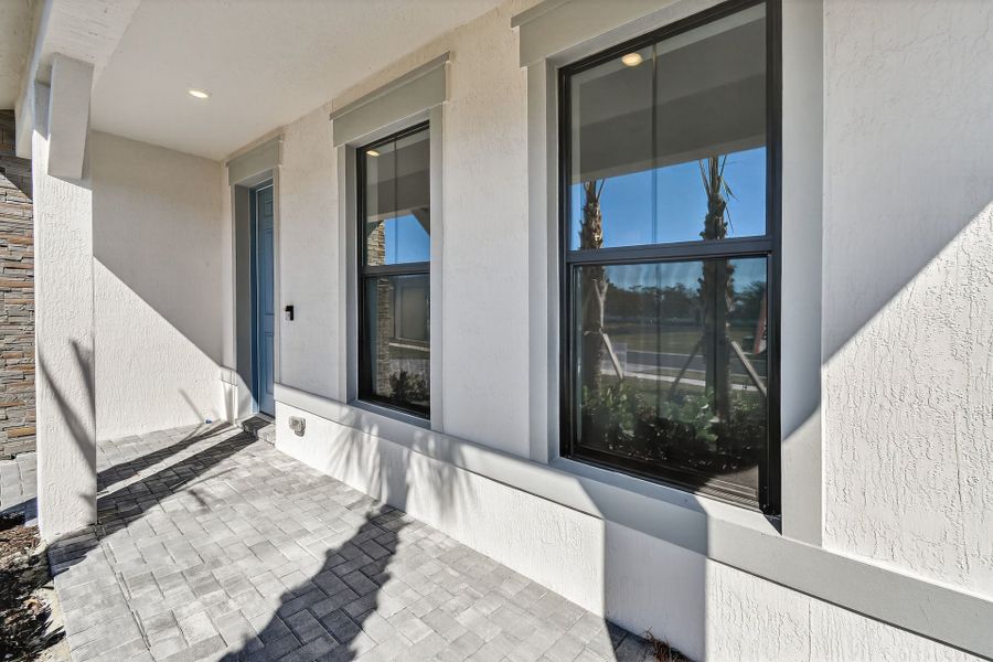 Exterior details and patio area of a home in Hendrix Reserve, Lake Worth (Image 4).
