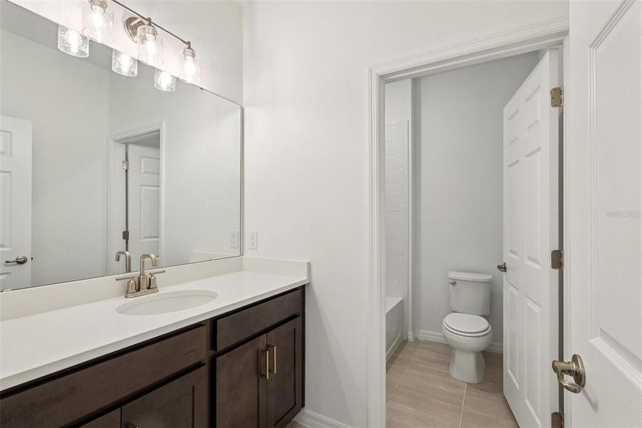 Furnished interior view inside a new home in Brack Ranch, St. Cloud (Image 10).