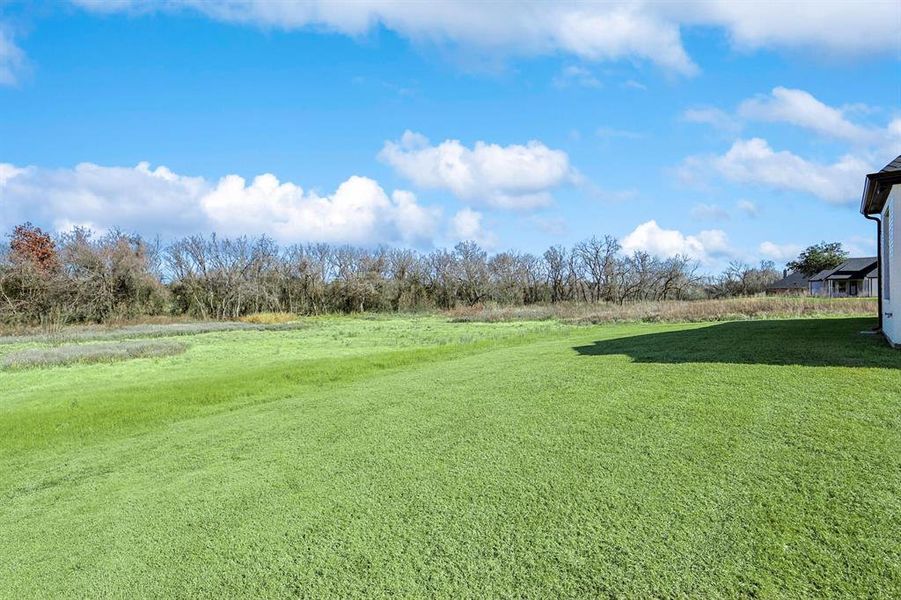 View of green lawn with a view of rural / pastoral area View of green lawn with a view of rural / pastoral area