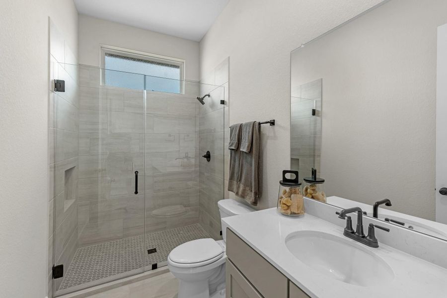 Furnished interior view inside a new home in Bridgeland, Cypress (Image 31).