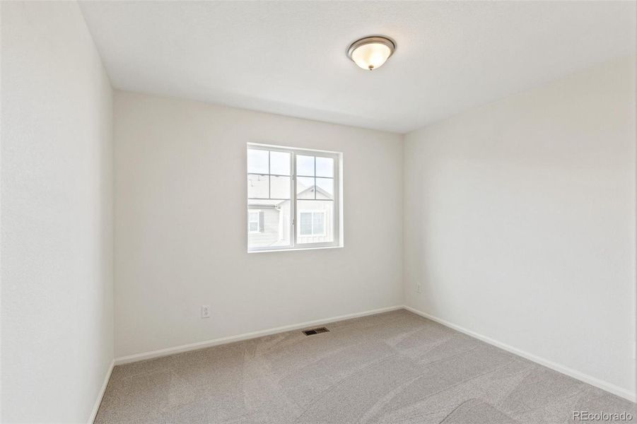 Spacious, unfurnished interior of a new home in Sky Ranch Villas, Watkins (Image 27).