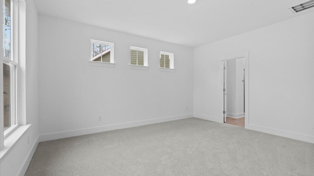 Highly skilled design shines in this elegant, restful primary suite near Moore, SC