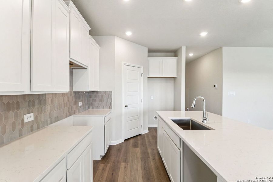 Furnished interior view inside a new home in Legendary Trails - Premier Series, Cibolo (Image 12). Furnished interior view inside a new home in Legendary Trails - Premier Series, Cibolo (Image 12).