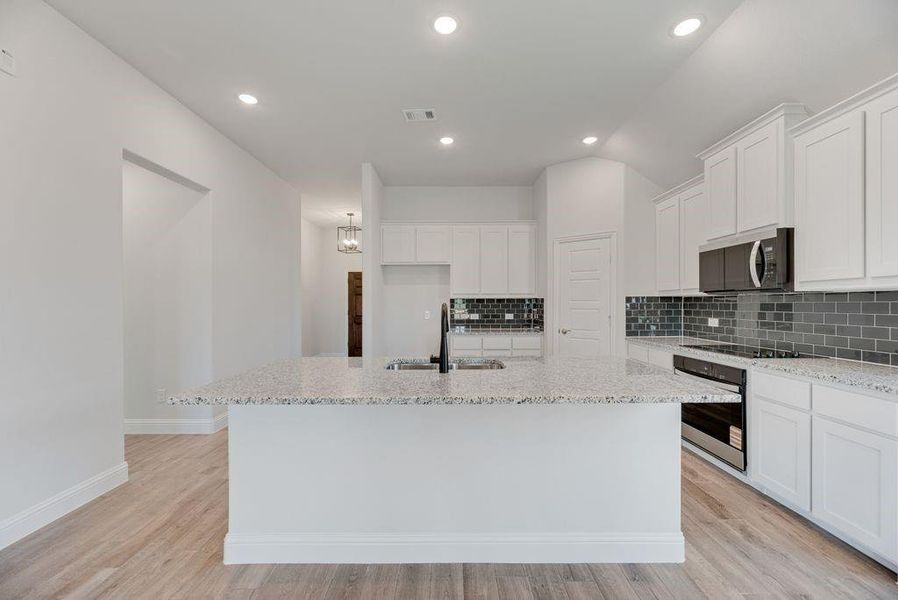 Furnished interior view inside a new home in , Pilot Point (Image 6). Furnished interior view inside a new home in , Pilot Point (Image 6).