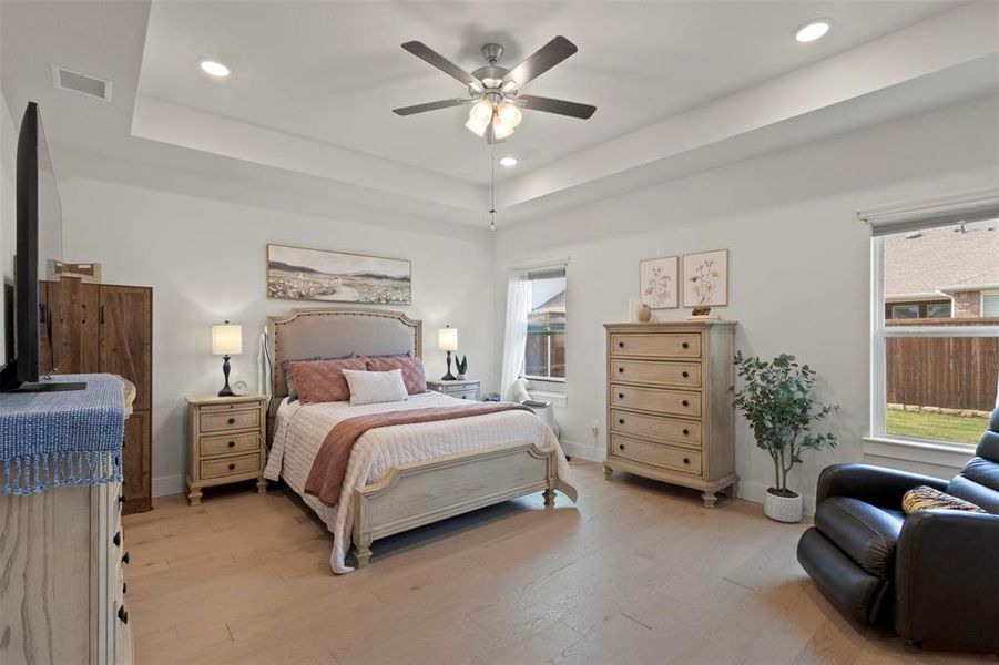 Spacious Primary Bedroon With Tray Ceiling