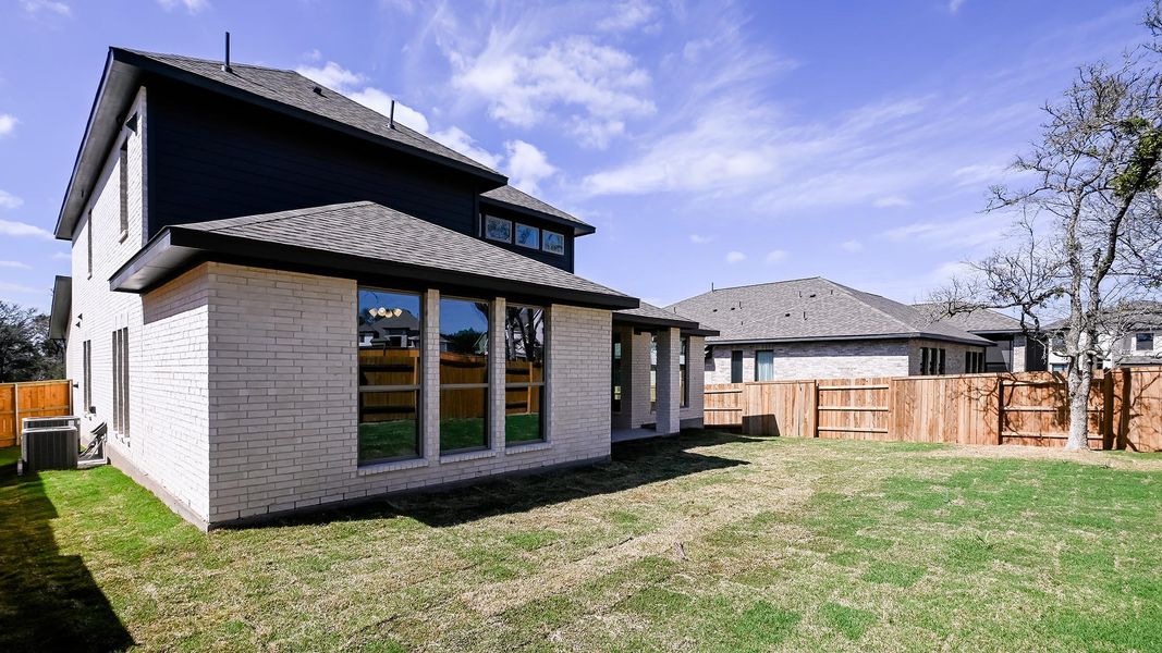 Exterior details and patio area of a home in 6 Creeks, Kyle (Image 4).
