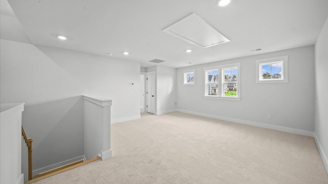 Representative furnished interior of a home built from the Kendrick - Finished Basement by DRB Homes in Pinebrook, Woodruff (Image 16).