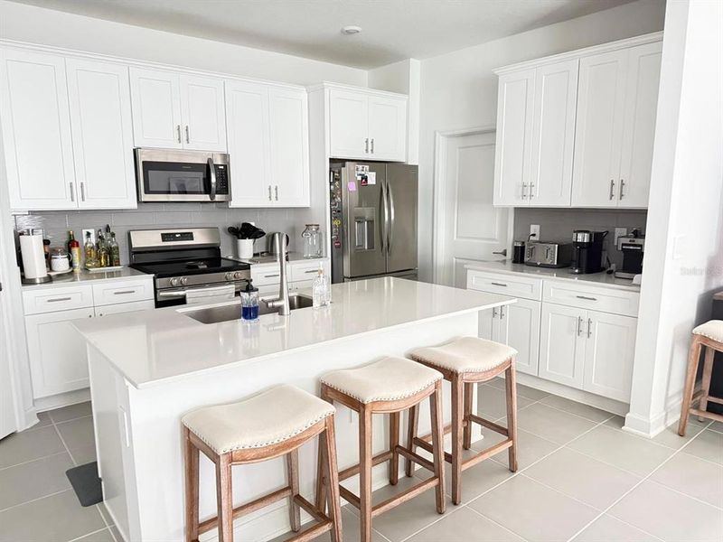 Furnished interior view inside a new home in Tohoqua, Kissimmee (Image 7).