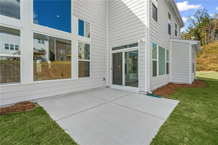 Exterior details and patio area of a home in Twin Lakes, Hoschton (Image 19).