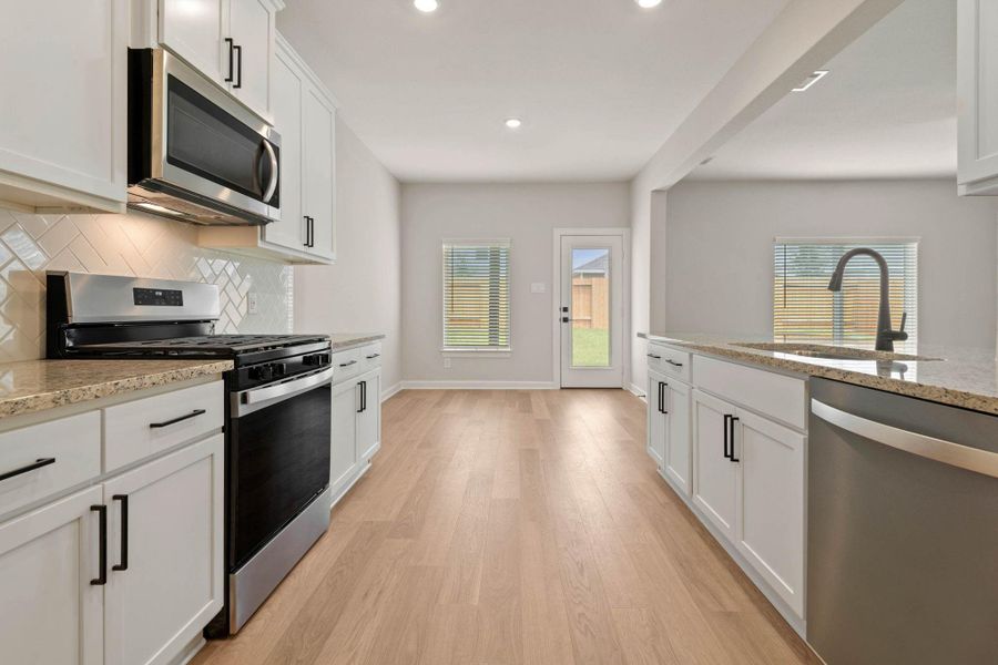 Furnished interior view inside a new home in Magnolia Woods, Magnolia (Image 6). Furnished interior view inside a new home in Magnolia Woods, Magnolia (Image 6).