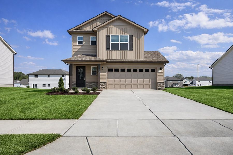 Front exterior of a new home in Wheatfield, Shelbyville, TN, highlighting curb appeal (Image 12).