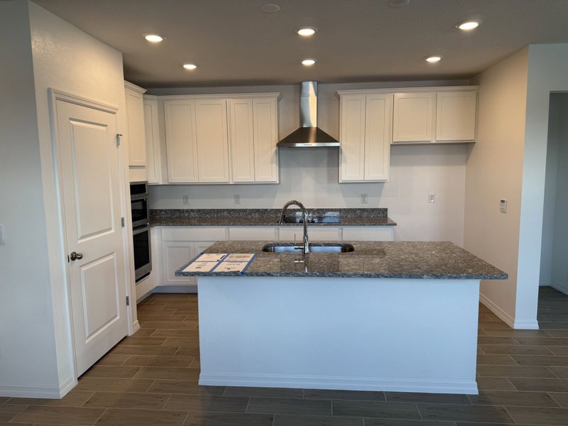 Furnished interior view inside a new home in Lake Deer Estates, Poinciana (Image 3).