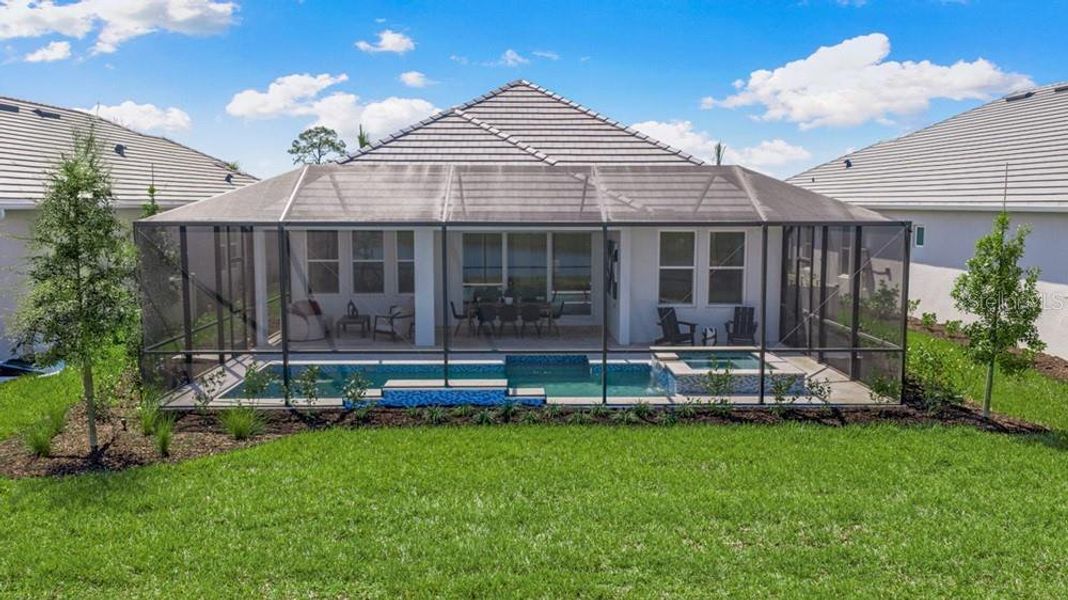 Exterior details and patio area of a home in Skye Ranch Community Group Page, Sarasota (Image 18).