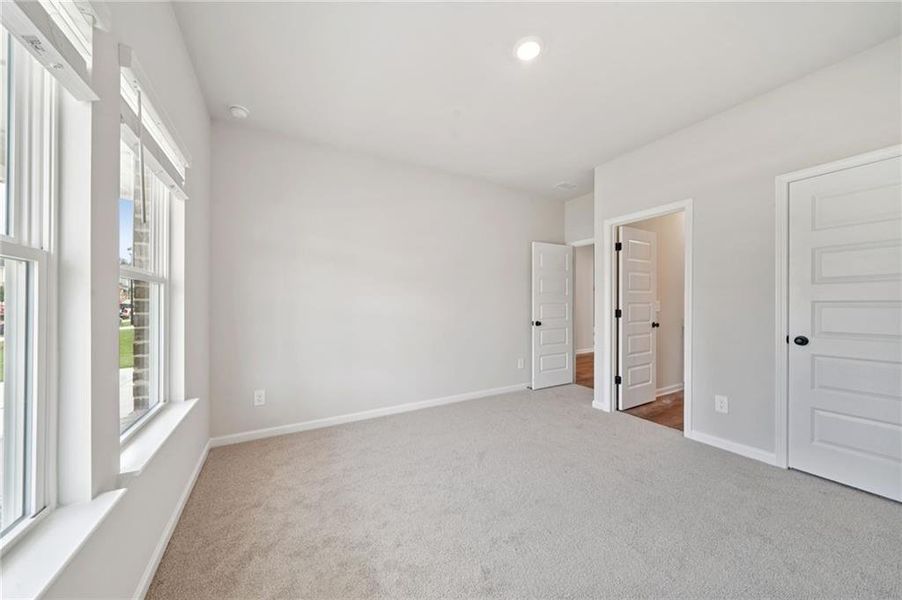 Spacious, unfurnished interior of a new home in Vines at Mill Creek - Estate Series, Braselton (Image 30).