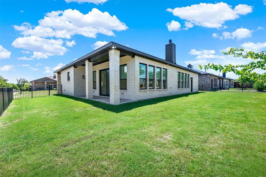 Exterior details and patio area of a home in , McKinney (Image 21).