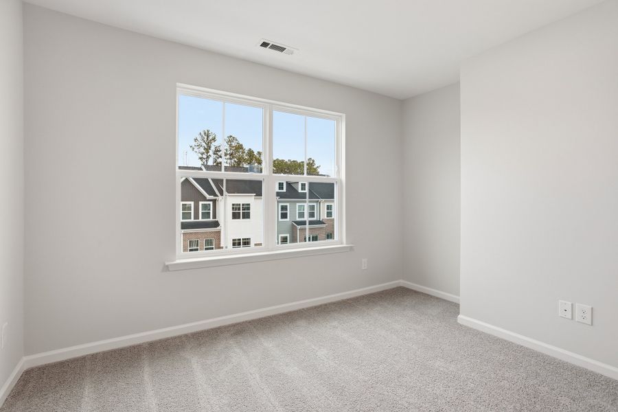 Spacious, unfurnished interior of a new home in Renaissance at White Oak, Garner (Image 29).