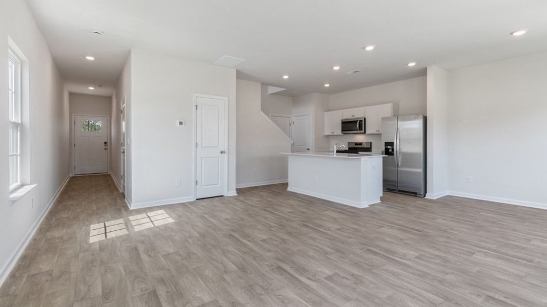 Spacious, unfurnished interior of a new home in The Townes at Matthews Landing, Fuquay Varina (Image 15). Spacious, unfurnished interior of a new home in The Townes at Matthews Landing, Fuquay Varina (Image 15).