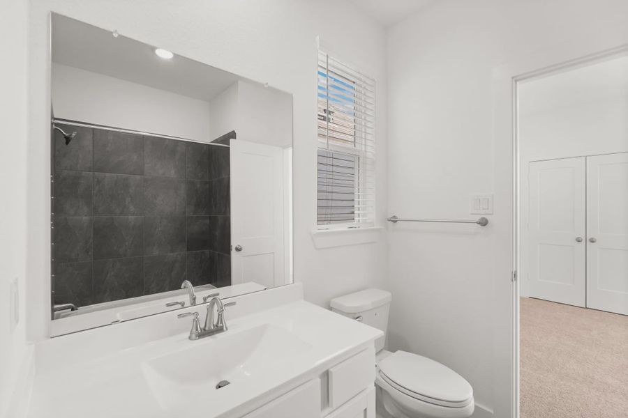 Representative furnished interior of a home built from the Cheverny by Chesmar Homes in Sienna Chateau, Missouri City (Image 8).