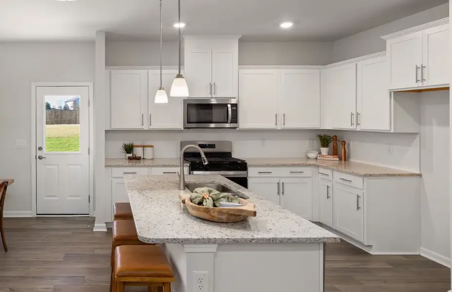 Furnished interior view inside a new home in Saunders Farm, Willow Spring (Image 10).