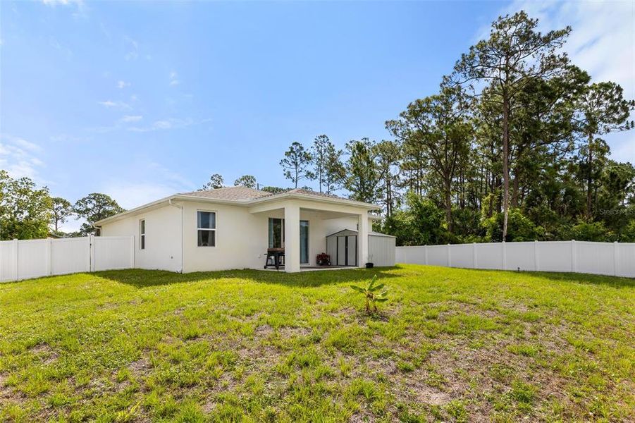 Exterior details and patio area of a home in , Palm Bay (Image 24).