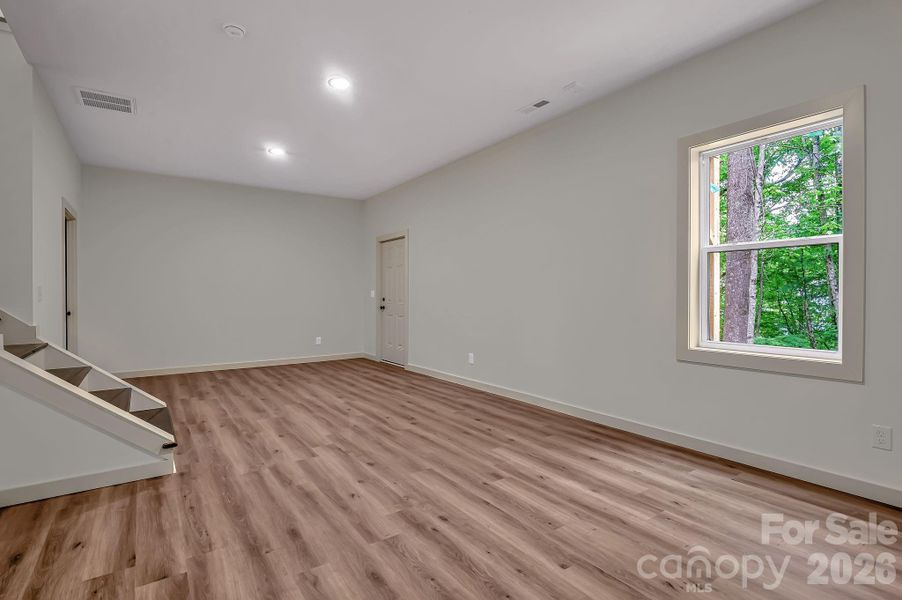 Spacious, unfurnished interior of a new home in , Waynesville (Image 11).