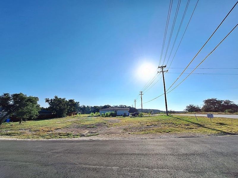 A spacious lot with ample room for new construction, bordered by mature trees and paved road access. A spacious lot with ample room for new construction, bordered by mature trees and paved road access.