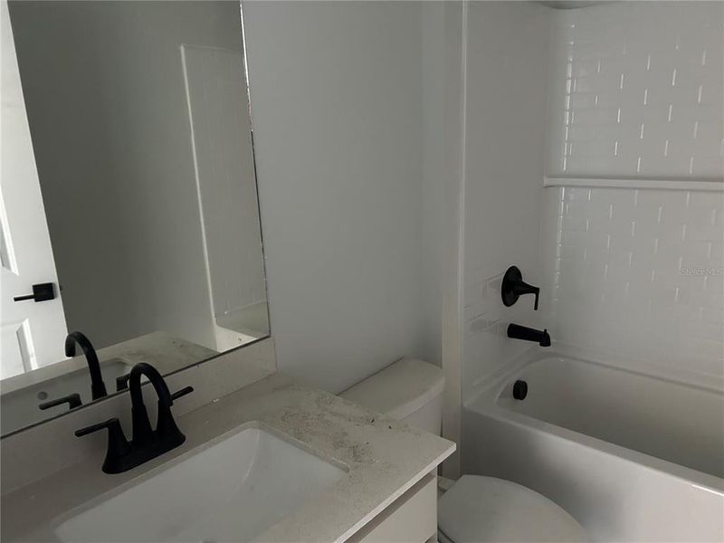 In-progress construction of a new home in Oakfield Trails Signature, Parrish, FL (Image 26). In-progress construction of a new home in Oakfield Trails Signature, Parrish, FL (Image 26).