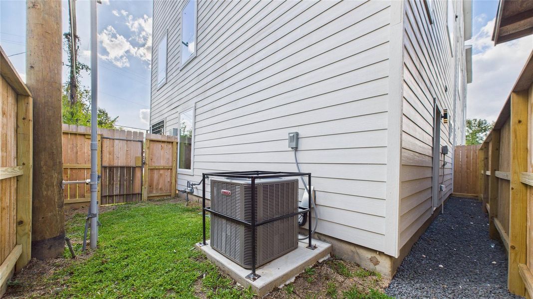 Exterior details and patio area of a home in , Houston (Image 3).