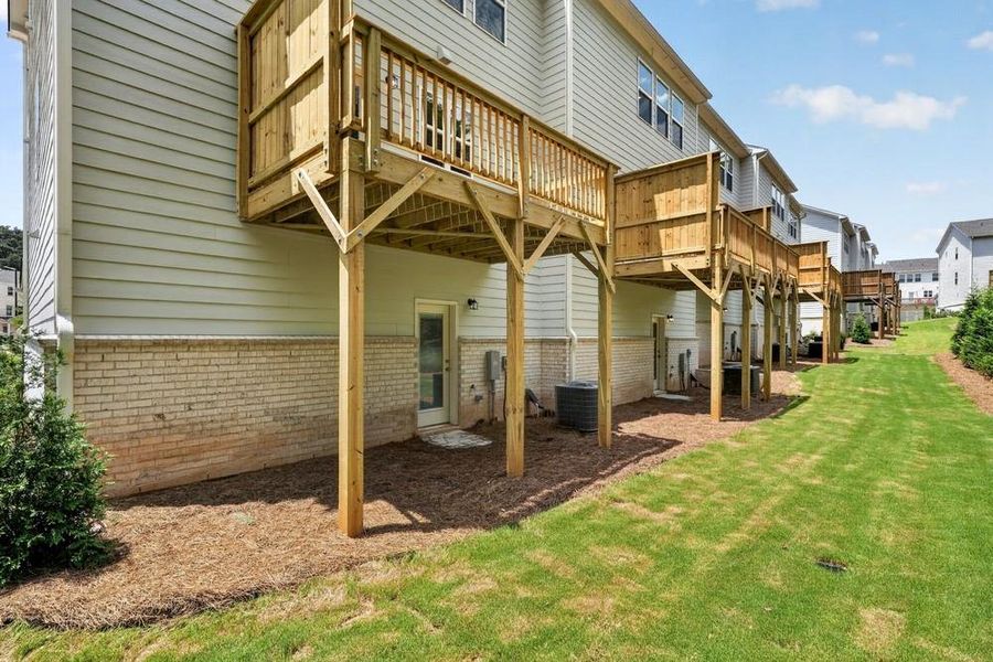 Exterior details and patio area of a home in Somerset at Veterans Memorial, Mableton (Image 3).