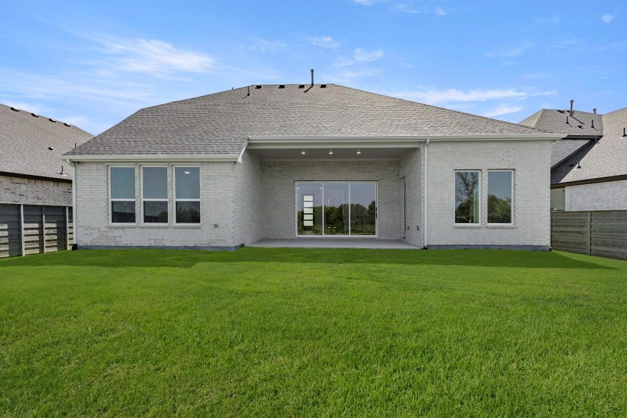 Exterior details and patio area of a home in Union Park, Little Elm (Image 17).