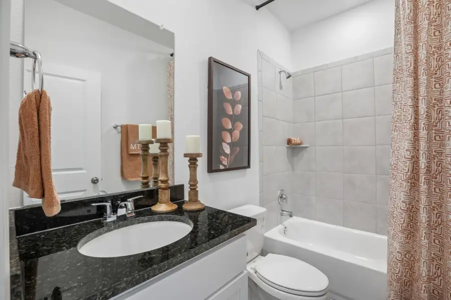 Representative furnished interior of a home built from the Sparrow by Taylor Morrison in Longview, Del Valle (Image 37).