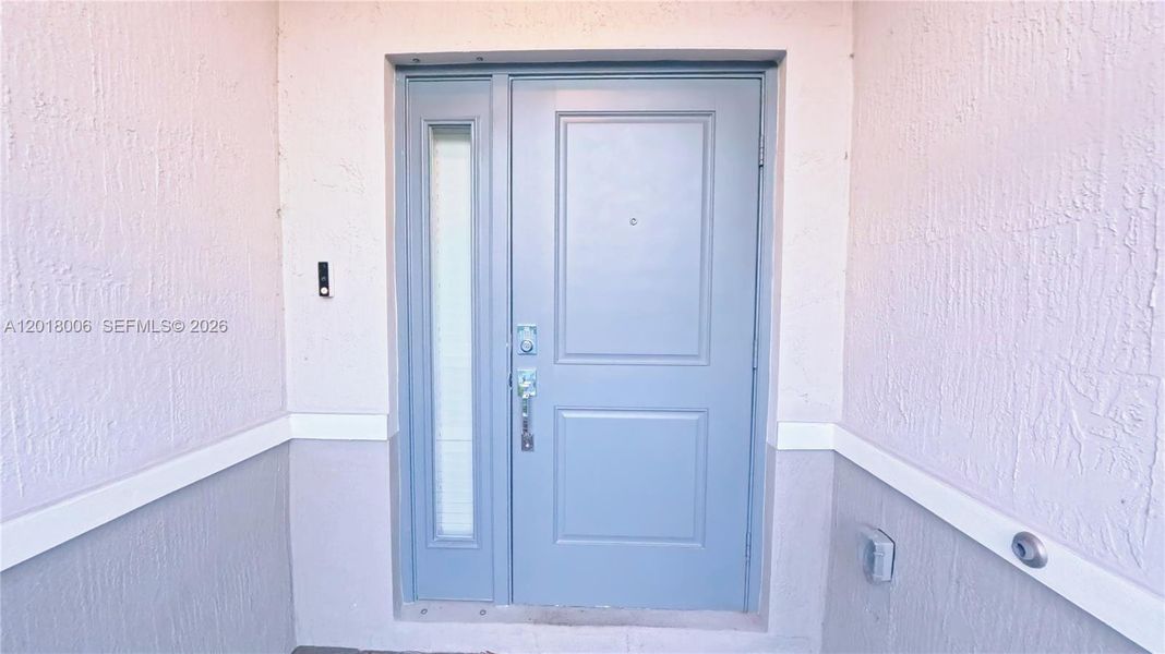 Exterior details and patio area of a home in , Florida City (Image 3).