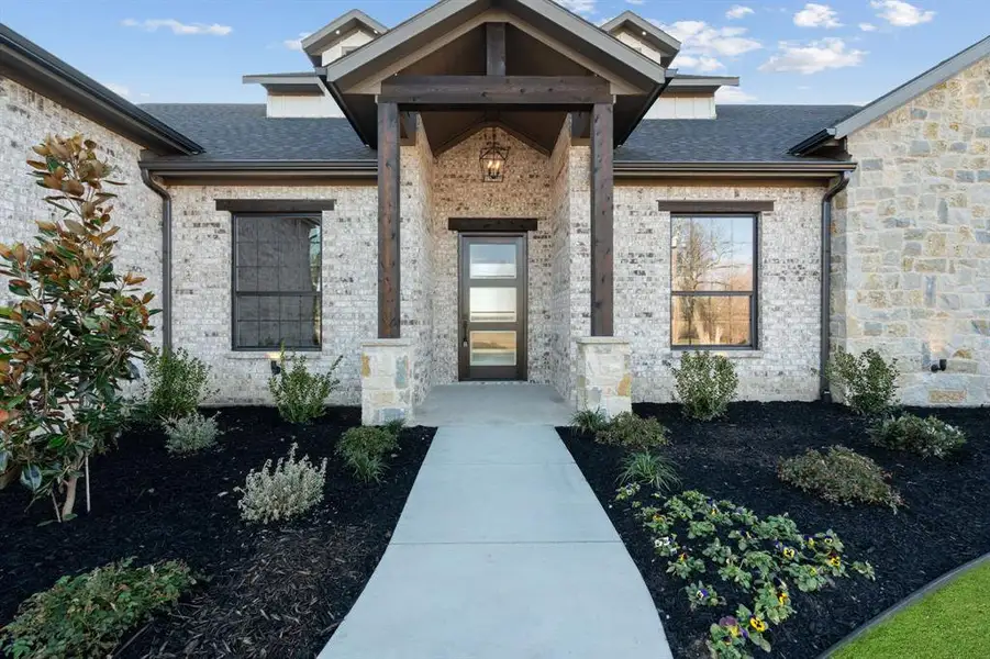 Exterior details and patio area of a home in , Farmersville (Image 4).