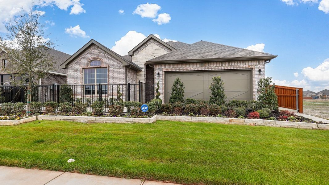 Representative exterior photo of a completed home built from the Portales by D.R. Horton in Morningstar, Aledo, TX (Image 22).