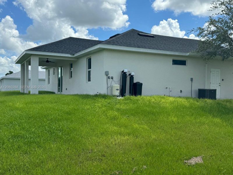 Exterior details and patio area of a home in , Lehigh Acres (Image 7). Exterior details and patio area of a home in , Lehigh Acres (Image 7).