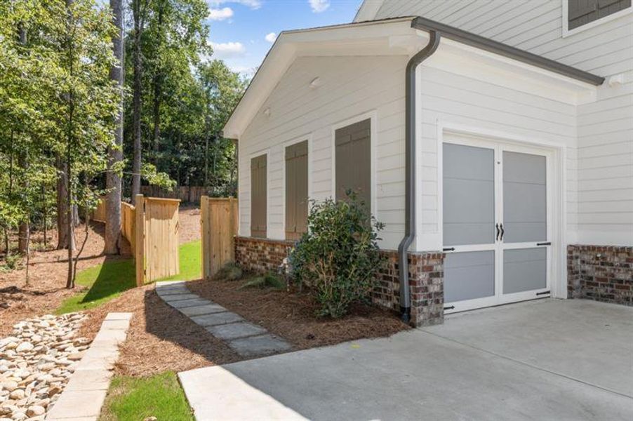 Exterior details and patio area of a home in Arden on Lanier, Cumming (Image 3).
