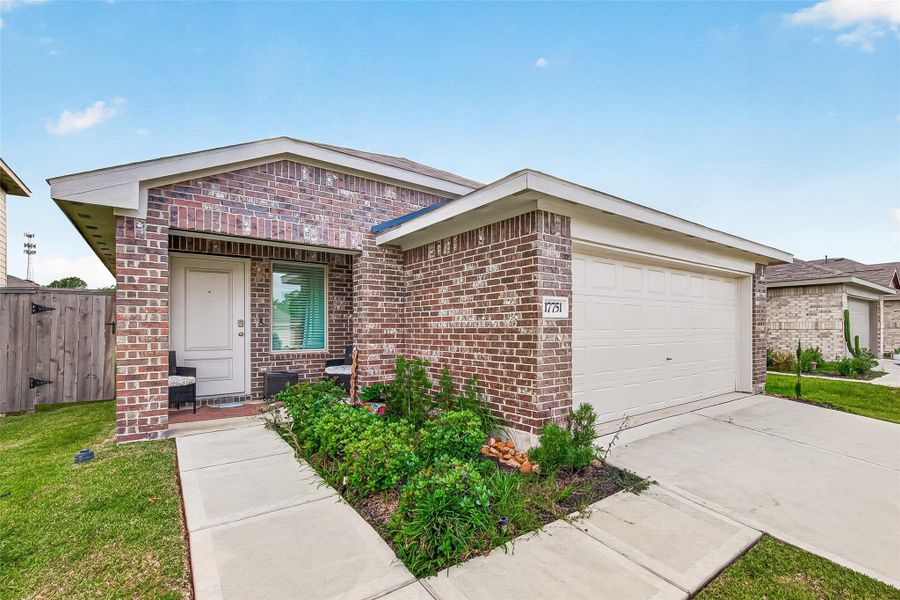 This charming single-story ranch-style home offers classic curb appeal with multi-tonal brick exterior This charming single-story ranch-style home offers classic curb appeal with multi-tonal brick exterior