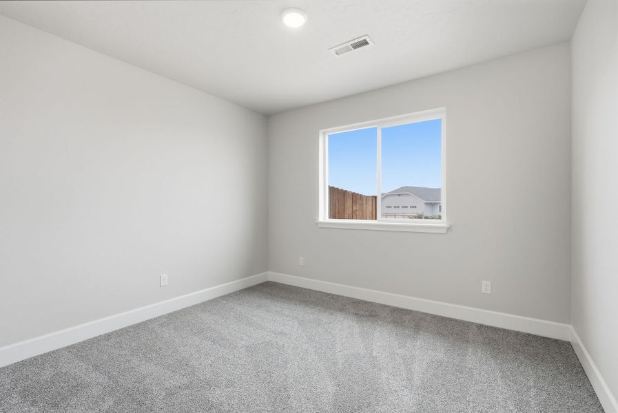 Representative unfurnished interior of a home built from the Laurel by MonteVista Homes in IronHorse, Prineville (Image 27).
