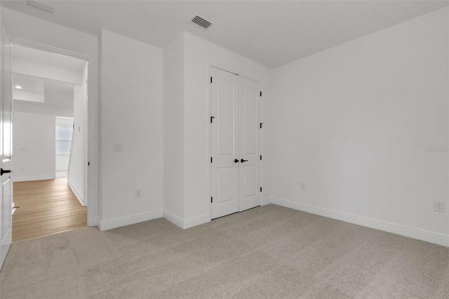 Spacious, unfurnished interior of a new home in Creeks Edge at Twin Rivers, Parrish (Image 54).