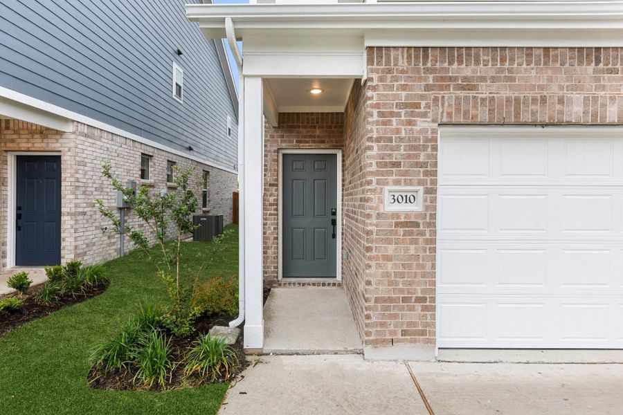 Front exterior of a new home in Lake Park Villas, Wylie, TX, highlighting curb appeal (Image 27).
