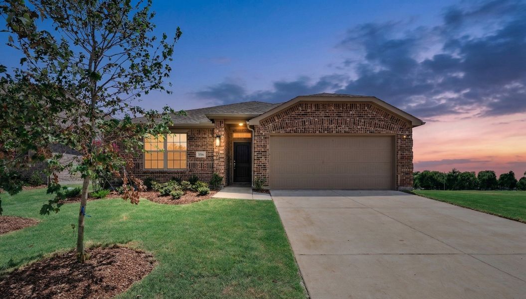 Front exterior of a new home in Fox Landing, Caddo Mills, TX, highlighting curb appeal (Image 2). Front exterior of a new home in Fox Landing, Caddo Mills, TX, highlighting curb appeal (Image 2).